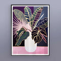 Framed botanical poster displayed in a modern living room
